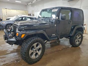  Salvage Jeep Wrangler